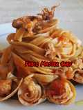 Fettuccine Integrale con Ciuffi di Calamari, Vongole e Pelati
