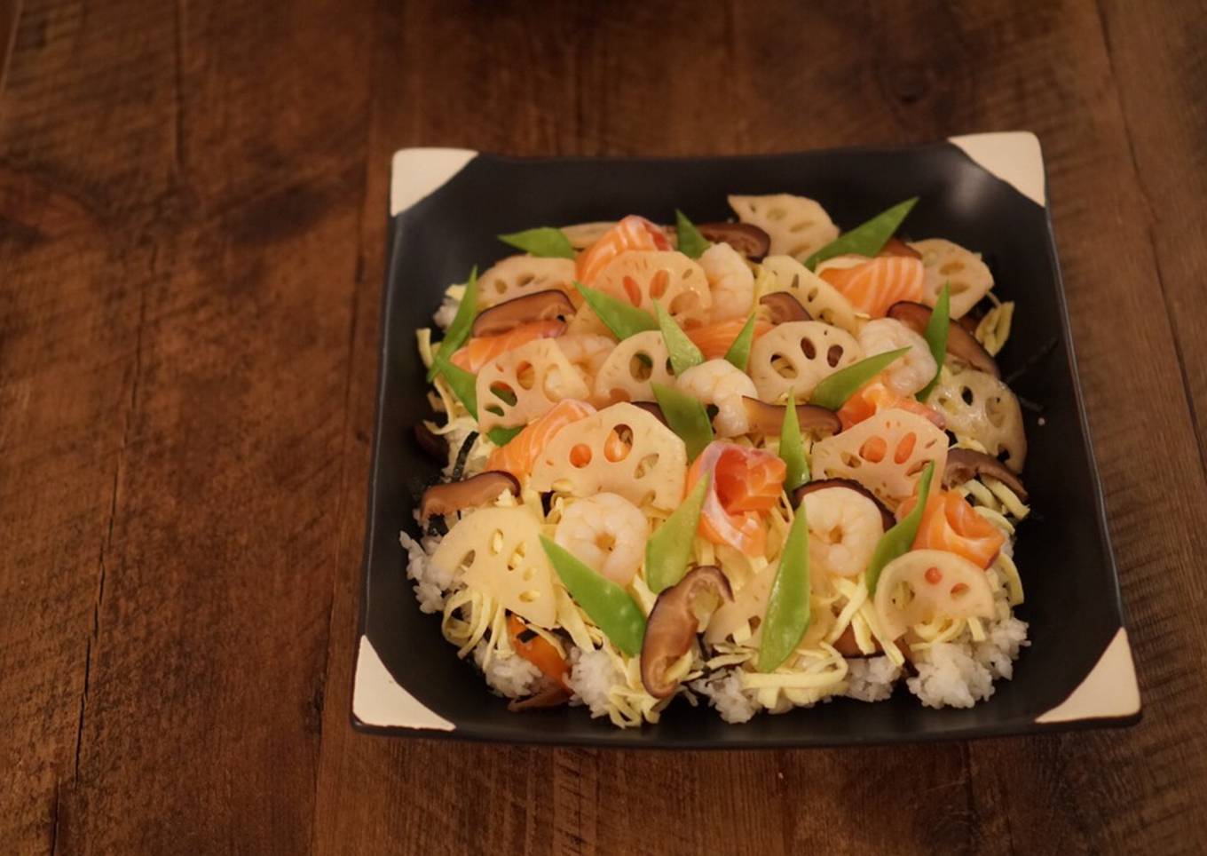 Chirashizushi (Scattered Sushi) with salmon and shrimp - Japanese sushi