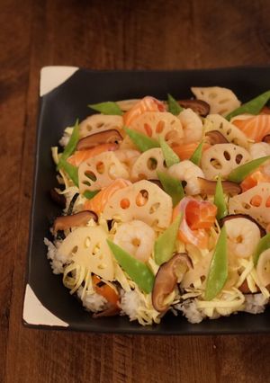 A picture of Chirashizushi (Scattered Sushi) with salmon and shrimp - Japanese sushi.