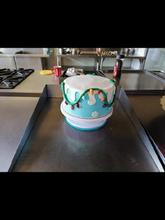 Una foto de Pastel de fondant diseño navideño