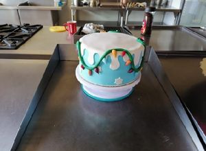 Una foto de Pastel de fondant diseño navideño