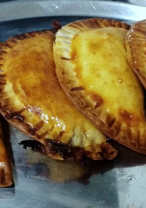 Una foto de Empanadillas de morcilla y mermelada de tomate