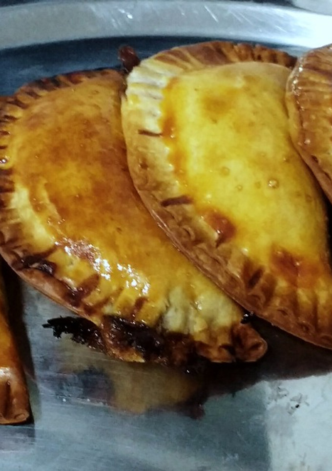 Una foto de Empanadillas de morcilla y mermelada de tomate