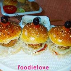 A picture of Grilled jackfruit seed patties burger with Garlic Mayo.