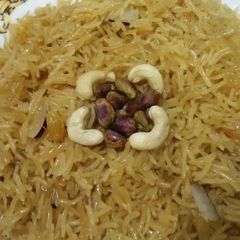 A picture of Gur waly chawal.