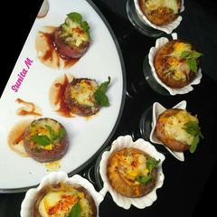 A picture of Baked stuffed ONIONS -JACKETS.