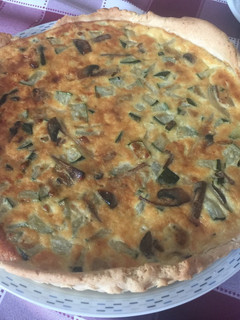 Una foto de Quiche de calabacín y champiñones