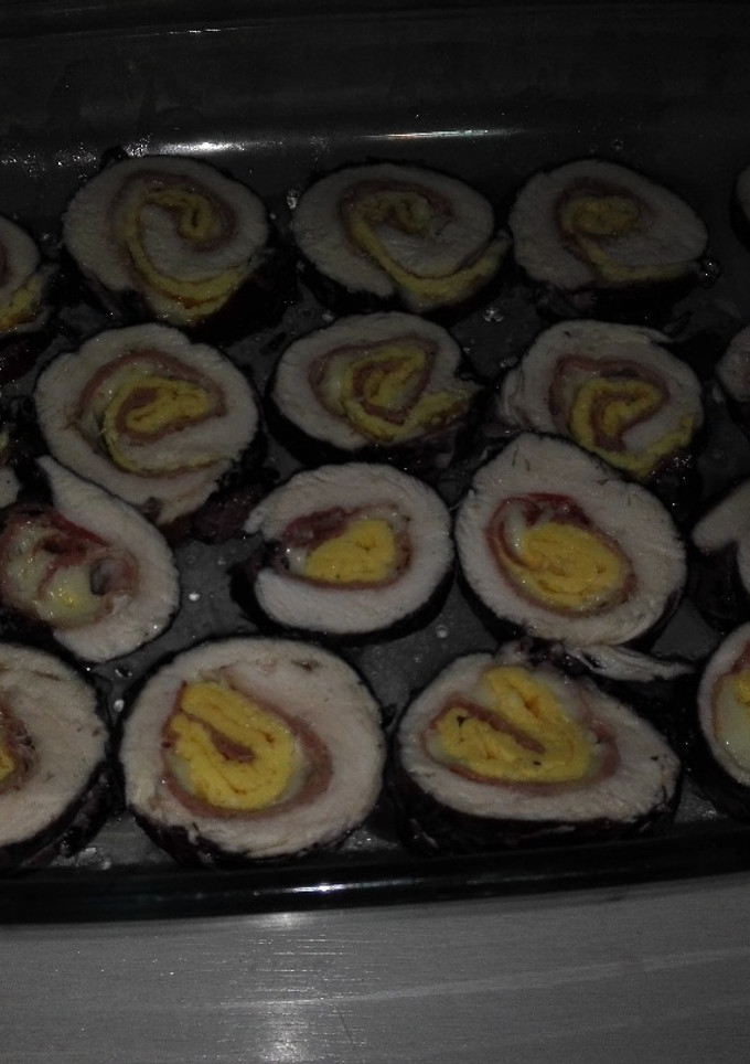 Una foto de Pechugas rellenas de jamón serrano, queso curado y tortilla fran