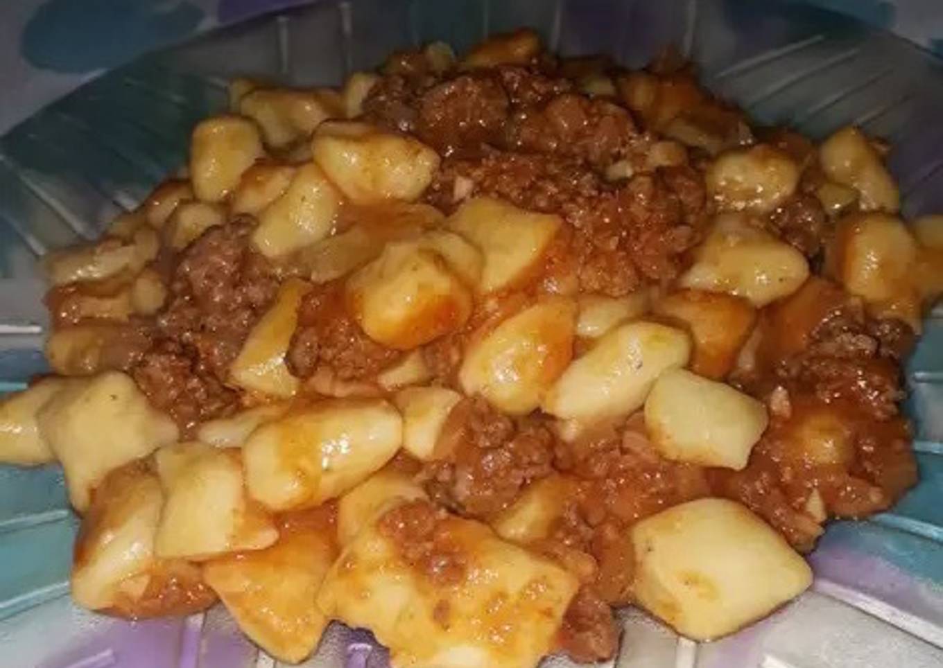 Ñoquis especiados con salsa tipo boloñesa