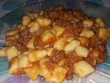 Ñoquis especiados con salsa tipo boloñesa