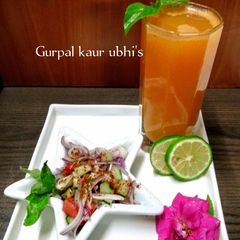 A picture of Golden Sparking Heart : Mother's Love Day. Carrot Ginger Elixir with Tulsi Red onion Kachumber salad.