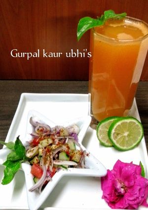 A picture of Golden Sparking Heart : Mother's Love Day. Carrot Ginger Elixir with Tulsi Red onion Kachumber salad.