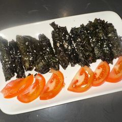 A picture of Bò Lá Lốt - Vietnamese Beef and pork wrapped in a betel leaf - AMAZING - Enjoy :P.