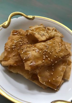 A picture of Fried Egg Roll Wraps with Syrup.