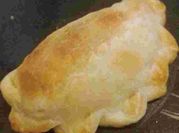 Una foto de empanada de humita fácil