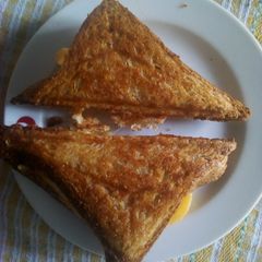 A picture of Egg and cheddar toasted sandwich.