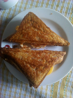 A picture of Egg and cheddar toasted sandwich.