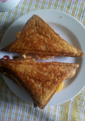 A picture of Egg and cheddar toasted sandwich.