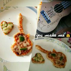 A picture of Bread guitar pizza.