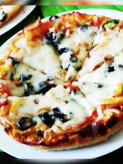 صورة لوصفة بيتزا الخضار بعجينه العشر دقايق