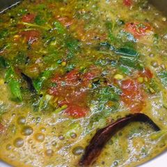 A picture of Ponnangane spinach rasam.