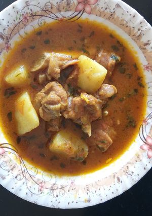 A picture of Mutton potato curry.