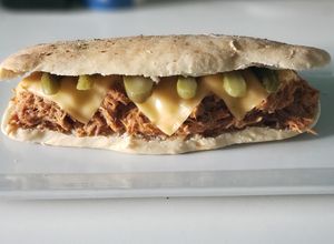 Una foto de 🇺🇸 Sándwich Pulled Pork 🇺🇸