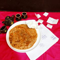 A picture of Cheeni ka Paratha.