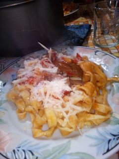 Una foto de Fideos caseros con tuco express