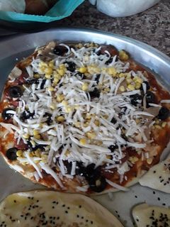 صورة لوصفة بيتزا بسيطة 😋