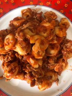 Una foto de Tortellinis en salsa boloñesa