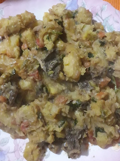 A picture of Matoke,Irish Potatoes, Veges and Matumbo combo.