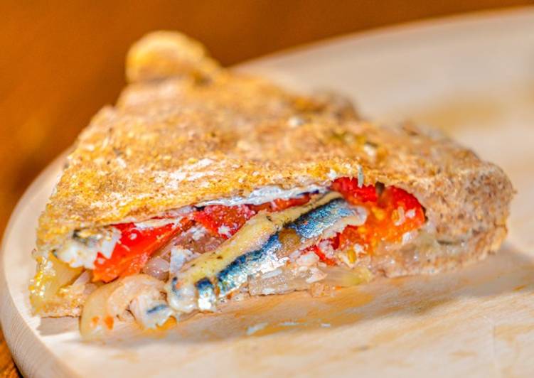 Recetta di Veloce PanFocaccia Integrale con ripieno alle Acciughe