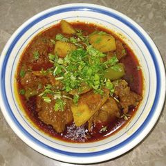 A picture of Aloo Gosht.
