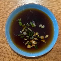 A picture of Sushi dipping sauce.