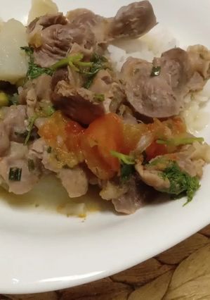Foto de Moelas estufadas com tomates e ervilhas