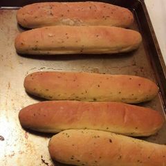 A picture of Garlic bread sticks.