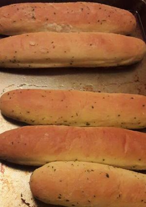 A picture of Garlic bread sticks.