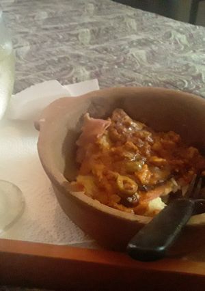 Una foto de Lasaña de jamón y queso a la salsa boloñesa