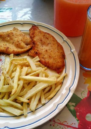 Una foto de Pechugas con Papas