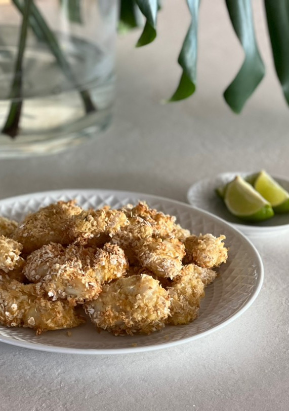 Una foto de Nuggets de merluza con avena y panko en freidora de aire