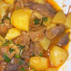 A picture of Stewed Beef served with Watu.