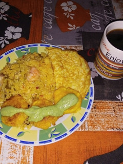 Una foto de Arroz con Mariscos 🍤🍛
