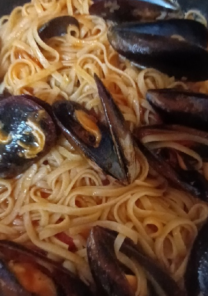 Una foto de Espaguetis con mejillones