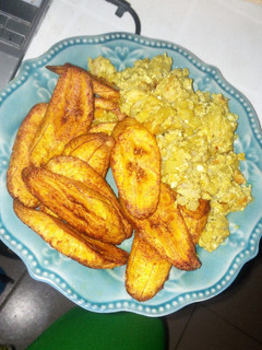 A picture of Fried plantains with irish potatoes egg sauce.