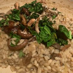 A picture of Creamy mixed mushroom risotto.