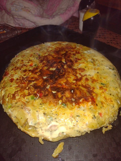 Una foto de Tortilla de papa rellena