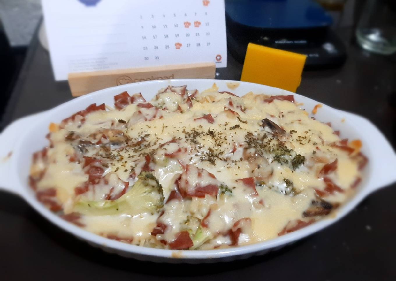 86. Cheesy baked potatoes with bechamel sauce