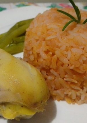 Una foto de Arroz rojo 🍚🍅