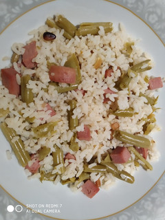 Una foto de Arroz con judías y piñones